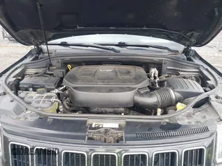 2016 Jeep Grand Cherokee Laredo with VIN 1C4RJFAG2GC436005, listed as a IAAI auction lot 42377859 with 129,724 mi miles and . Bid and sale history available at DreamBid. Image 10.