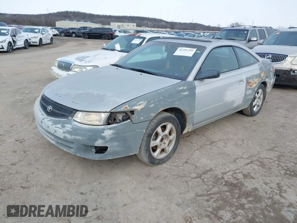 1999 Toyota Solara SE with VIN 2T1CF22P7XC106169, listed as a IAAI auction lot 41291391 with 297,339 mi miles. Bid and sale history available at carsss.com. Image 2.