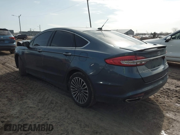 2018 Ford Fusion Titanium with VIN 3FA6P0D94JR187880, listed as a IAAI auction lot 41690869 with 120,214 mi miles and . Bid and sale history available at DreamBid. Image 3.