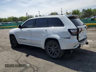 2018 Jeep Grand Cherokee High Altitude with VIN 1C4RJFCT9JC293653, listed as a Copart auction lot 58833145 with 96,808 mi miles and Salvage title. Bid and sale history available at DreamBid. Image 2.