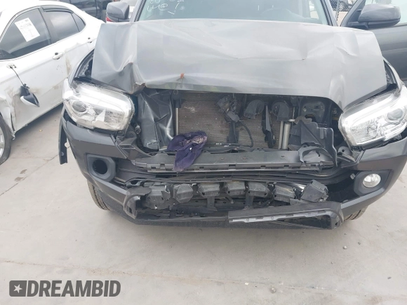 2023 Toyota Tacoma SR5 z VIN 3TMAZ5CN8PM201702, wystawiony jako IAAI lot #42060855 z przebiegiem 17 705 mil mil oraz . Historia ofert i sprzedaży dostępna na DreamBid. Obrazek 6.