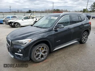 2018 BMW X1 xDrive28i with VIN WBXHT3C36J5F90927, listed as a Copart auction lot 45130255 with 119,192 mi miles and Salvage Title. Bid and sale history available at carsss.com. Image 1.