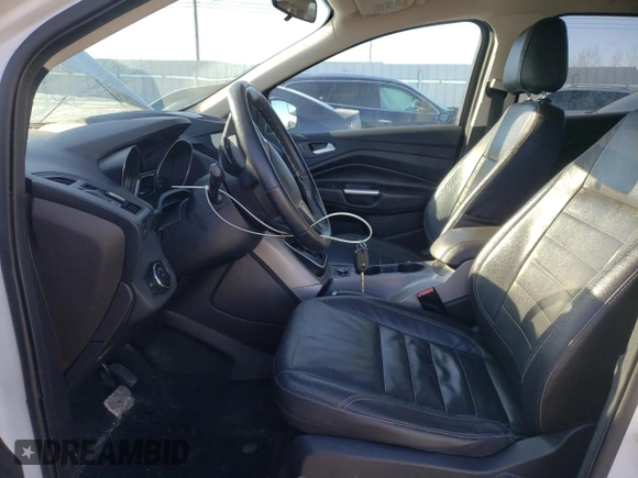 2014 Ford Escape SE z VIN 1FMCU9G9XEUB66869, wystawiony jako Copart lot #59546115 z przebiegiem 224 021 mil mil oraz Szkoda całkowita • Salvage title. Historia ofert i sprzedaży dostępna na DreamBid. Obrazek 7.