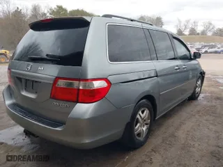 2005 Honda Odyssey EX-L with VIN 5FNRL38745B035909, listed as a IAAI auction lot 41717426 with 292,297 mi miles. Bid and sale history available at carsss.com. Image 4.