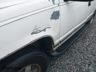 1999 Chevrolet Tahoe with VIN 1GNEC13RXXR101766, listed as a IAAI auction lot 41393447 with 387,448 mi miles. Bid and sale history available at carsss.com. Image 6.