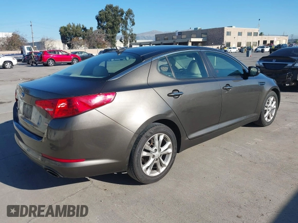 2013 Kia Optima LX with VIN 5XXGM4A74DG114626, listed as a IAAI auction lot 41349903 with 126,856 mi miles. Bid and sale history available at carsss.com. Image 4.