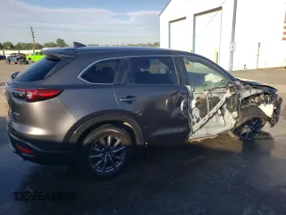 2021 Mazda CX-9 Sport with VIN JM3TCBBY5M0502888, listed as a Copart auction lot 61299673 with 50,576 mi miles and . Bid and sale history available at DreamBid. Image 3.