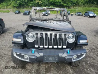 2023 Jeep Wrangler Sahara с VIN 1C4JJXP6XPW542086, выставлен на аукционе Copart как лот 64209345 с пробегом Не указан миль и Списание • Salvage title. История ставок и продаж доступна на DreamBid. Изображение 5.