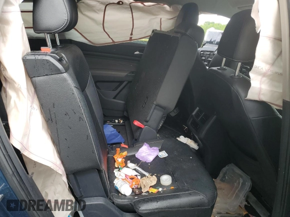 2023 Volkswagen Atlas SE z VIN 1V2HP2CA7PC515065, wystawiony jako Copart lot #57338515 z przebiegiem Nie podano mil oraz Szkoda całkowita • Salvage title. Historia ofert i sprzedaży dostępna na DreamBid. Obrazek 11.