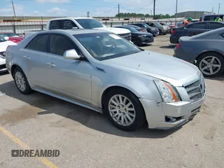 2009 Cadillac CTS RWD with VIN 1G6DV57V090108930, listed as a IAAI auction lot 42055709 with 161,657 mi miles and . Bid and sale history available at DreamBid. Image 1.