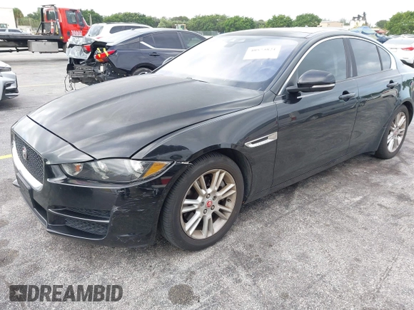 2017 Jaguar XE 25t Premium with VIN SAJAD4BG4HA956227, listed as a IAAI auction lot 40573821 with 152,395 mi miles. Bid and sale history available at carsss.com. Image 6.