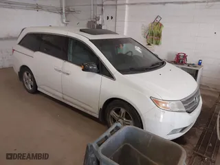 2011 Honda Odyssey Touring with VIN 5FNRL5H9XBB057468, listed as a IAAI auction lot 41405465 with 1 mi miles. Bid and sale history available at carsss.com. Image 1.