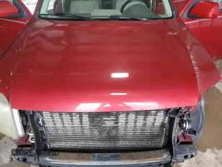2008 Mercury Mariner Premier z VIN 4M2CU97118KJ52951, wystawiony jako Copart lot #61640225 z przebiegiem 186 109 mil mil oraz Szkoda całkowita • Salvage title. Historia ofert i sprzedaży dostępna na DreamBid. Obrazek 12.