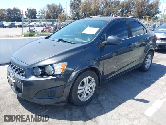 2014 Chevrolet Sonic LT with VIN 1G1JC5SB7E4146444, listed as a IAAI auction lot 42014386 with 85,122 mi miles and . Bid and sale history available at DreamBid. Image 2.