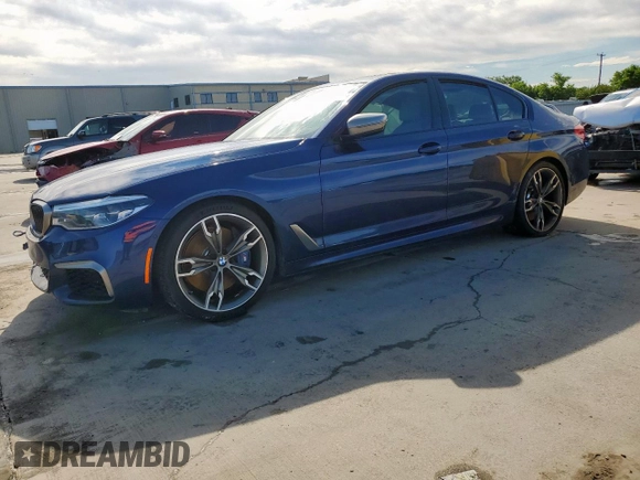 2020 BMW 5 Series M550i xDrive with VIN WBAJS7C09LCE06865, listed as a Copart auction lot 60140955 with Not provided miles and Salvage title. Bid and sale history available at DreamBid. Image 1.