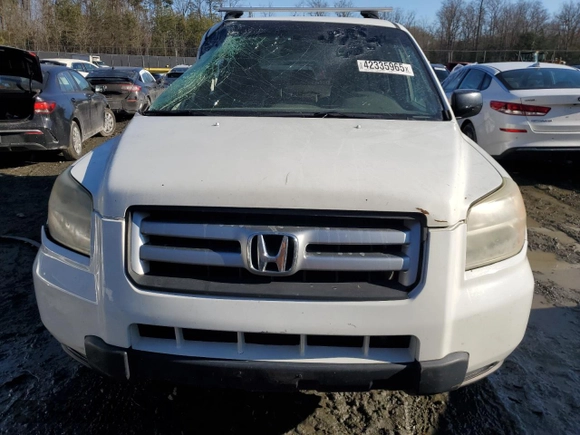 2006 Honda Pilot EX-L with VIN 5FNYF18706B026584, listed as a Copart auction lot 42335965 with 229,794 mi miles and Salvage Title. Bid and sale history available at DreamBid. Image 5.