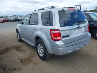 2009 Ford Escape Hybrid with VIN 1FMCU49319KA88009, listed as a IAAI auction lot 42065410 with 239,319 mi miles. Bid and sale history available at carsss.com. Image 3.