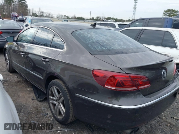 2013 Volkswagen CC Sport z VIN WVWBP7AN9DE524926, wystawiony jako IAAI lot #41448762 z przebiegiem 108 007 mil mil oraz . Historia ofert i sprzedaży dostępna na DreamBid. Obrazek 3.