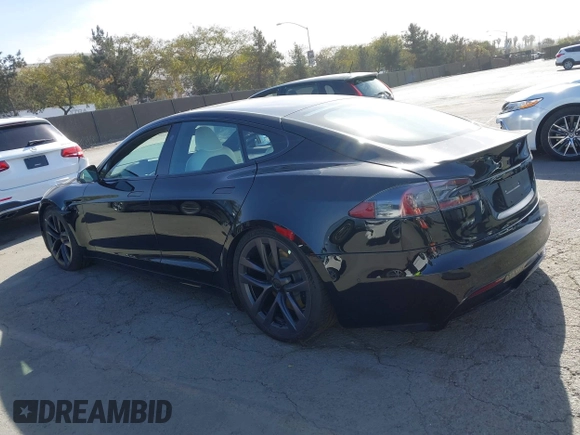 2022 Tesla Model S Plaid with VIN 5YJSA1E62NF460634, listed as a IAAI auction lot 41372644 with 16,050 mi miles and . Bid and sale history available at DreamBid. Image 3.