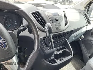 2016 Ford Transit Cargo with VIN 1FTYE1ZM1GKA06047, listed as a IAAI auction lot 42679265 with 124,601 mi miles and . Bid and sale history available at DreamBid. Image 6.