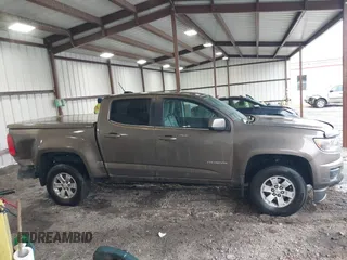 2015 Chevrolet Colorado 2WD WT z VIN 1GCGSAE34F1270479, wystawiony jako IAAI lot #41768612 z przebiegiem 158 984 mil mil oraz . Historia ofert i sprzedaży dostępna na DreamBid. Obrazek 13.