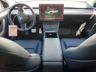2024 Tesla Model Y Long Range with VIN 7SAYGDEEXRA288960, listed as a Copart auction lot 60801525 with 18,942 mi miles and Salvage title. Bid and sale history available at DreamBid. Image 8.