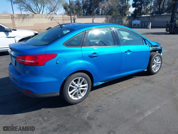 2017 Ford Focus SE with VIN 1FADP3F21HL246837, listed as a IAAI auction lot 41696492 with 84,124 mi miles. Bid and sale history available at carsss.com. Image 4.