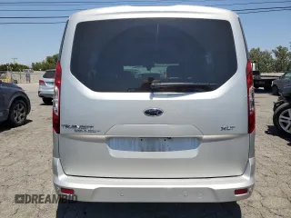 2014 Ford Transit Connect XLT z VIN NM0AE8F75E1150273, wystawiony jako Copart lot #59010195 z przebiegiem 173 295 mil mil oraz Czysty tytuł • Clean title. Historia ofert i sprzedaży dostępna na DreamBid. Obrazek 6.