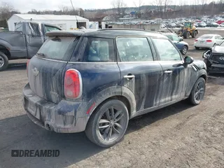 2013 MINI Countryman S ALL4 with VIN WMWZC5C58DWP30936, listed as a IAAI auction lot 41314553 with 128,405 mi miles and . Bid and sale history available at DreamBid. Image 4.