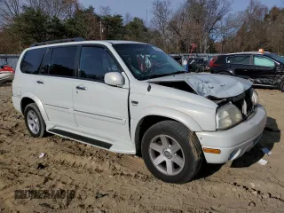2002 Suzuki XL7 Standard z VIN JS3TX92V324118918, wystawiony jako Copart lot #83589184 z przebiegiem 203 827 mil mil oraz Szkoda całkowita • Salvage title. Historia ofert i sprzedaży dostępna na DreamBid. Obrazek 4.