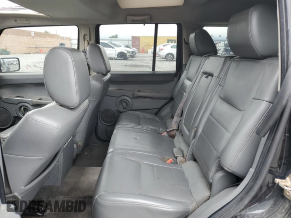 2006 Jeep Commander z VIN 1J8HH48K86C289122, wystawiony jako Copart lot #55810935 z przebiegiem 140 063 mil mil oraz Szkoda całkowita • Salvage title. Historia ofert i sprzedaży dostępna na DreamBid. Obrazek 11.