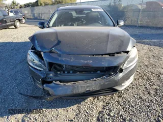 2015 Volvo S60 T5 Drive-E Premier Plus with VIN YV126MFC0F1313708, listed as a Copart auction lot 88606785 with 56,884 mi miles and Salvage Title. Bid and sale history available at carsss.com. Image 5.