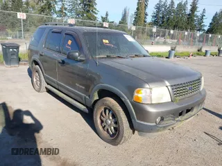 2004 Ford Explorer XLT with VIN 1FMDU73K84ZA70032, listed as a IAAI auction lot 41990961 with 205,084 mi miles. Bid and sale history available at carsss.com. Image 1.
