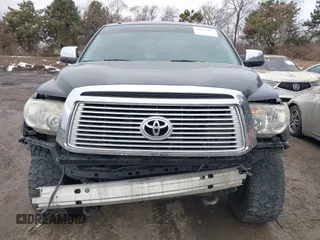 2012 Toyota Tundra 4WD Truck LTD with VIN 5TFHW5F19CX218772, listed as a IAAI auction lot 41472955 with 134,928 mi miles. Bid and sale history available at carsss.com. Image 12.