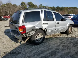 2004 Jeep Grand Cherokee Laredo z VIN 1J4GW48S84C200617, wystawiony jako Copart lot #51732045 z przebiegiem 171 452 mil mil oraz Nie do naprawy • Non repairable. Historia ofert i sprzedaży dostępna na DreamBid. Obrazek 3.