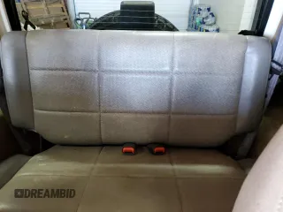 2002 Jeep Wrangler Sahara z VIN 1J4FA59S62P751858, wystawiony jako Copart lot #56638165 z przebiegiem 270 770 mil mil oraz Szkoda całkowita • Salvage title. Historia ofert i sprzedaży dostępna na DreamBid. Obrazek 10.