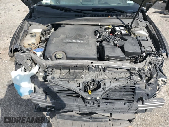 2016 Lincoln MKZ z VIN 3LN6L2GK6GR615811, wystawiony jako Copart lot #48397495 z przebiegiem 98 926 mil mil oraz Szkoda całkowita • Salvage title. Historia ofert i sprzedaży dostępna na DreamBid. Obrazek 11.
