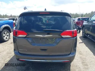 2017 Chrysler Pacifica Touring L with VIN 2C4RC1BGXHR667397, listed as a IAAI auction lot 42085117 with 63,996 mi miles and . Bid and sale history available at DreamBid. Image 17.
