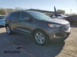 2020 Ford Edge SEL with VIN 2FMPK4J94LBA44997, listed as a Copart auction lot 57360895 with 69,212 mi miles and Salvage title. Bid and sale history available at DreamBid. Image 4.
