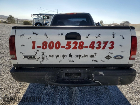 2000 Ford F-150 XL with VIN 2FTPF17Z5YCA99717, listed as a Copart auction lot 70658194 with Not provided miles and Salvage title. Bid and sale history available at DreamBid. Image 6.