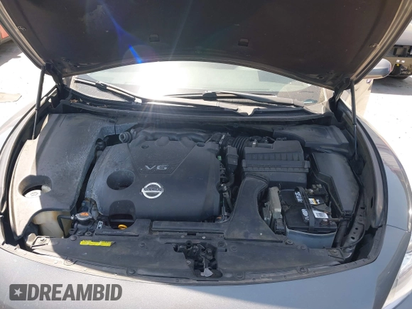 2014 Nissan Maxima S z VIN 1N4AA5AP8EC484229, wystawiony jako IAAI lot #42348184 z przebiegiem 150 681 mil mil oraz . Historia ofert i sprzedaży dostępna na DreamBid. Obrazek 10.