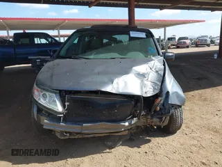 2012 Honda Odyssey EX-L with VIN 5FNRL5H6XCB103498, listed as a IAAI auction lot 42065658 with 104,933 mi miles and . Bid and sale history available at carsss.com. Image 6.