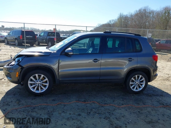 2014 Volkswagen Tiguan SE z VIN WVGAV3AX0EW511694, wystawiony jako IAAI lot #41811345 z przebiegiem 95 129 mil mil oraz . Historia ofert i sprzedaży dostępna na DreamBid. Obrazek 14.