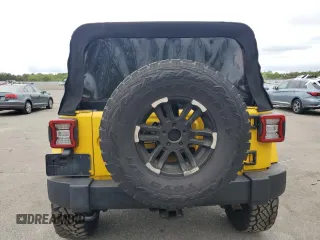 2009 Jeep Wrangler Unlimited Rubicon with VIN 1J8GA69109L761089, listed as a Copart auction lot 57975985 with 195,530 mi miles and Salvage title. Bid and sale history available at DreamBid. Image 6.