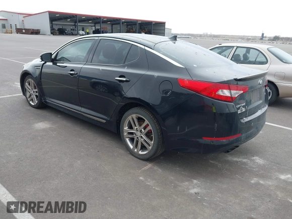 2013 Kia Optima SX with VIN 5XXGR4A63DG141938, listed as a IAAI auction lot 41760964 with 77,241 mi miles and . Bid and sale history available at DreamBid. Image 3.