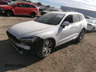 2022 Volvo XC60 Recharge Plug-In Hybrid Inscription with VIN YV4BR0DL8N1977341, listed as a IAAI auction lot 34114187 with 10,593 mi miles. Bid and sale history available at carsss.com. Image 2.