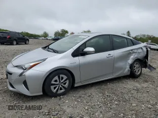2016 Toyota Prius Four z VIN JTDKARFU4G3014285, wystawiony jako Copart lot #55821925 z przebiegiem 111 189 mil mil oraz Szkoda całkowita • Salvage title. Historia ofert i sprzedaży dostępna na DreamBid. Obrazek 1.