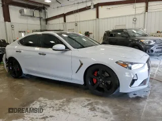 2020 Genesis G70 3.3T with VIN KMTG34LE6LU048573, listed as a Copart auction lot 67907884 with 63,531 mi miles and Salvage Title. Bid and sale history available at carsss.com. Image 4.