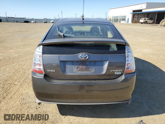 2007 Toyota Prius z VIN JTDKB20U573288978, wystawiony jako Copart lot #57469155 z przebiegiem 170 422 mil mil oraz Szkoda całkowita • Salvage title. Historia ofert i sprzedaży dostępna na DreamBid. Obrazek 6.