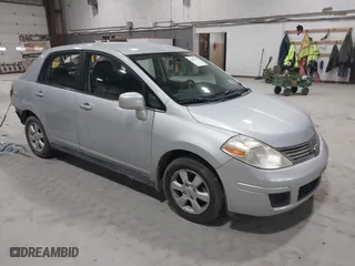 2007 Nissan Versa 1.8 S with VIN 3N1BC11E97L460306, listed as a IAAI auction lot 41697479 with 117,053 mi miles. Bid and sale history available at carsss.com. Image 1.